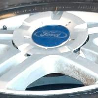 4 CERCHI IN LEGA R 15 4 FORI CO0MPLETI DI GOMME