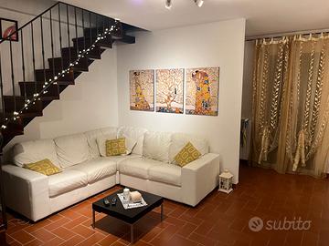 Divano ad angolo in pelle