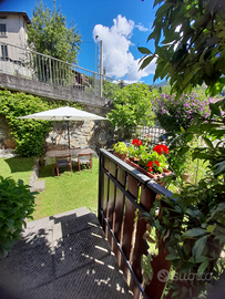 Bilocale con giardino e balconata