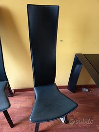 tavolo in vetro nero con set sedie 