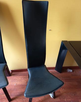tavolo in vetro nero con set sedie 