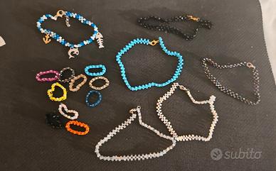 Set cavigliere, anelli e bracciale