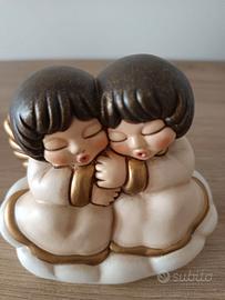 Angeli thun su nuvola