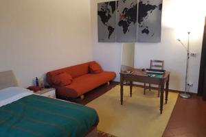 Camera ampia con posto auto zona Piazza Puccini