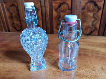 2 bottigliette grappa o olio