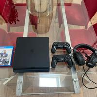 PlayStation 4 slim + 2 joystick + cuffie + FIFA 23