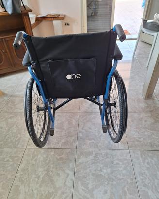 Sedia a rotelle con cuscino anti decubito
