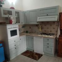Cucina ad angolo Scavolini con credenza in legno