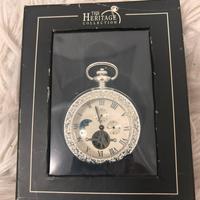 Silver plated pocket watch.The Heritage Collection