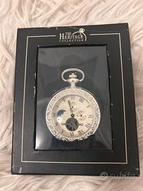 Silver plated pocket watch.The Heritage Collection