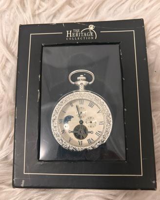 Silver plated pocket watch.The Heritage Collection