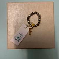 Anello con pendente F