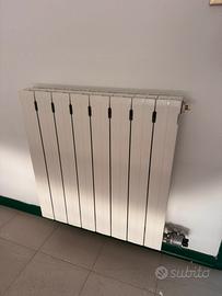 4 termosifoni in ferro bianchi