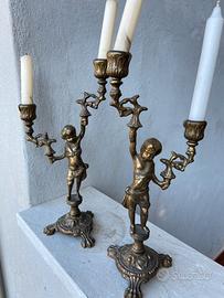 Coppia candelabri puttini stile Liberty