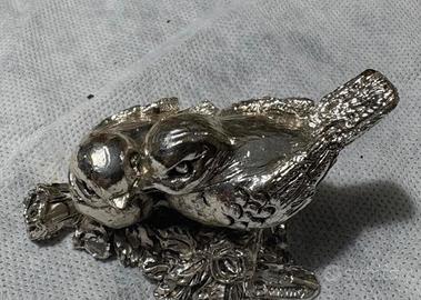 Piccola statuetta in R argento.