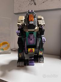 Dinosauro Transformers anni 90'