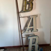 Insegna luminosa originale “BAR” al neon  Vintage