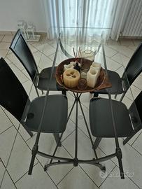 Tavolo in cristallo completo di 4 seggiole  cuoio