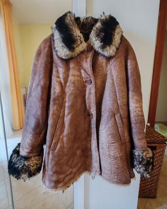 giacca in pelle e pelliccia