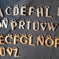 Ciondoli a forma di lettera in acciaio inox