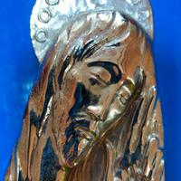 Oggetto religioso in metallo