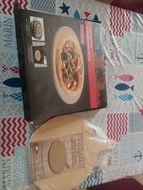 pietra refrattaria e pala in legno