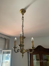 Coppia di lampadari in ottone