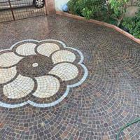 Posatore di porfido pavimentazioni eserne