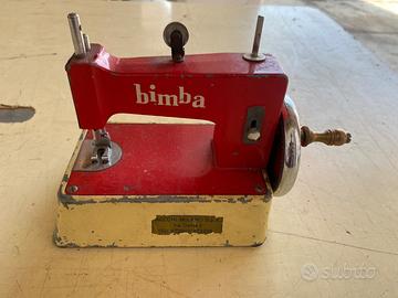 Singer BIMBA ANNI 50 in metallo