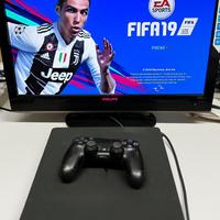 PS4 Slim 1TB + pad + cavi + 2 giochi