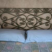 Ferro battuto, testiera letto