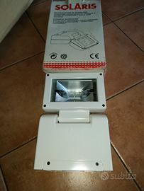 Proiettore orientabile per lampade a vapore