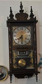 orologio a  pendolo e datario