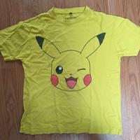 T-shirt Pokemon gialla taglia XS