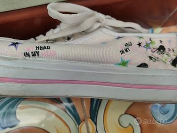 Converse basse rosa fantasia graffiti