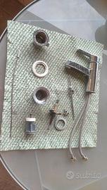 Rubinetto e piletta lavello bagno