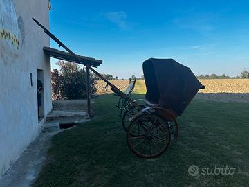 Calesse d’epoca a 2 ruote con Capote