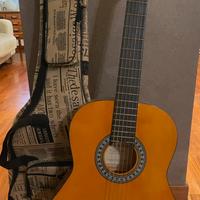 Chitarra con custodia e supporto
