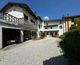 CASA DI TESTA CON DUE UNITÀ E GIARDINO RECINTATO