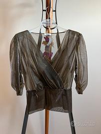Blusa effetto trasparente