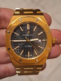 Orologio automatico uomo dorato