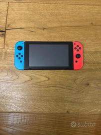 Bundle nintwndo switch+ custodia +accesori+ 3 gioc