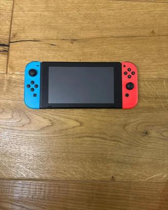 Bundle nintwndo switch+ custodia +accesori+ 3 gioc