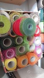 Bobine di carta e nastri per pacchi