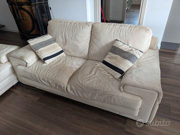 Coppia divani in pelle bianca