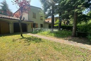 VILLETTA A SCHIERA CON GIARDINO PRIVATO E GARAGE