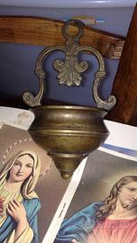 Due antichissime acquasantiere in bronzo