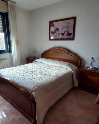 Camera da letto in arte povera