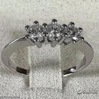 ANELLO TRILOGY ORO 18kt. E DIAMANTI NATURALI 0,52