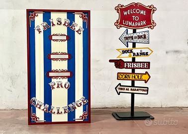 Gioco  in legno lancio del frisbee luna park bimbo